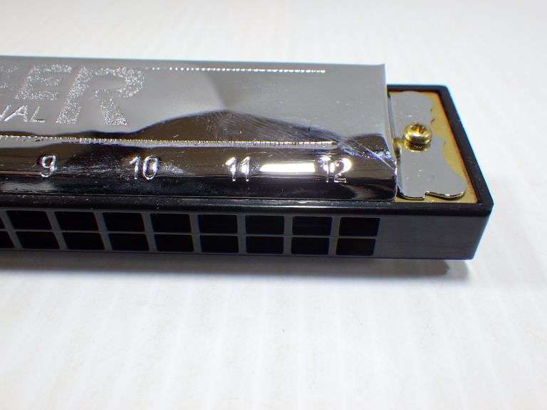 Older Hohner International Weekender tremolo harmonica, 8"W x 7"D x 8"H