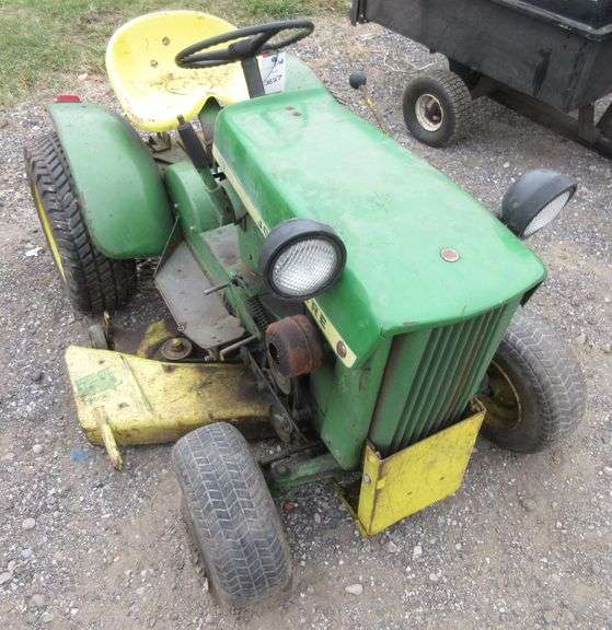John Deere 110 garden tractor, hydraulic lift, solid 42" mower deck, has been stored for several
