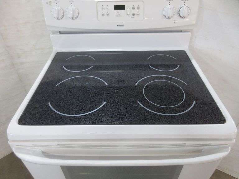 White Kenmore glass top electric range, only used in Florida for