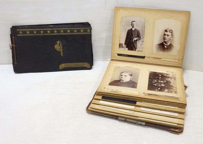 Antique scrapbooks filled with photos Albrecht Auction Service