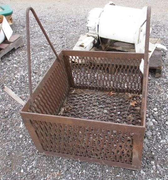 Wire firewood basket, 26"W x 26"D x 16"H Albrecht Auction Service