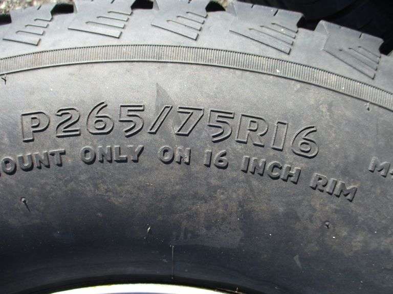 (2) Mastercraft Courser A/T 265/75R16 tires on 6lug steel Chevy rims