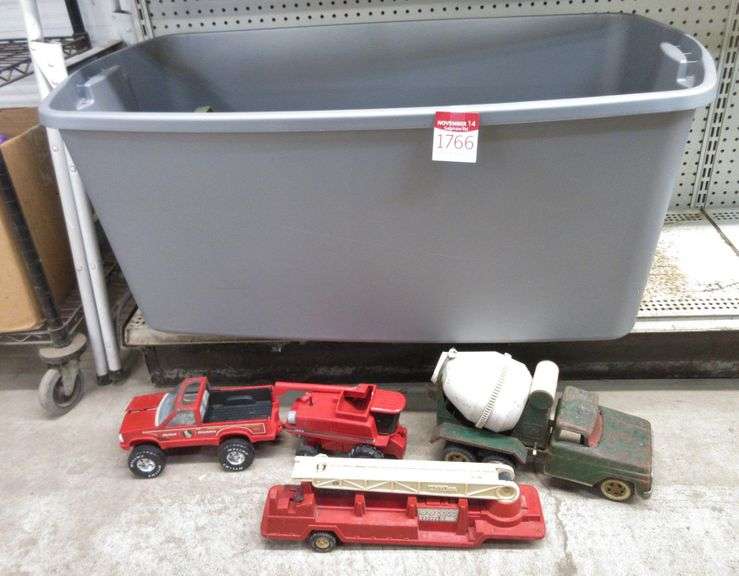 Old metal toy trucks, includes Tonka truck, (2) Cement mixers, Army