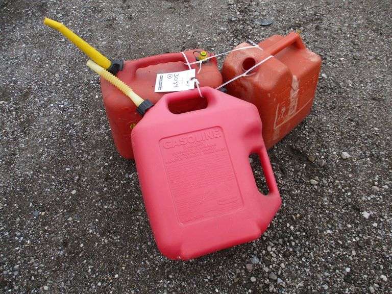 (3) Plastic gas cans, includes Two 5Gallon, and One 4Gallon