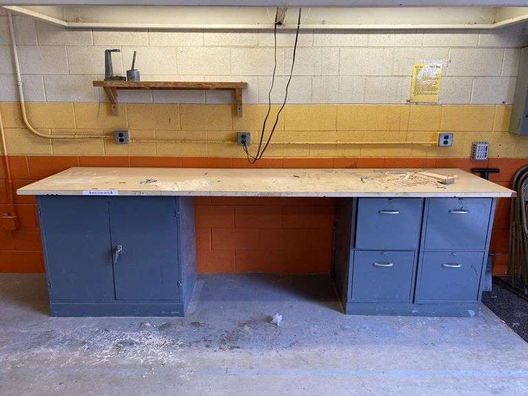 Large workbench with metal tool base, 10’ x 30” x 3’H (Located at Unionville Sebewaing