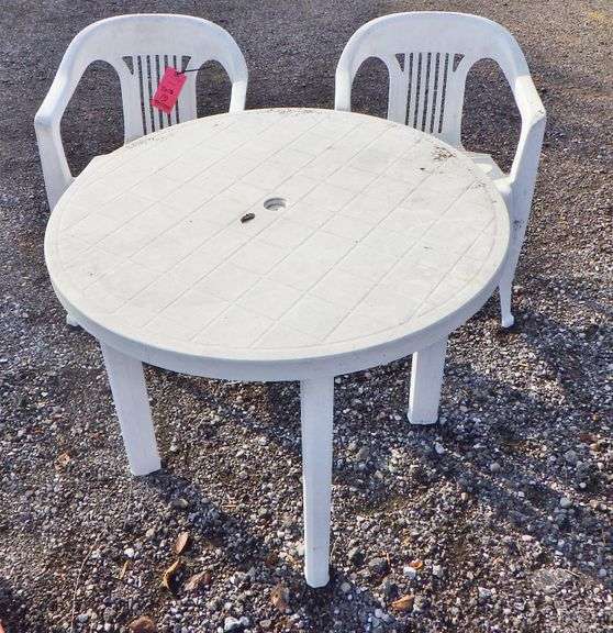 Plastic patio table and (2) Chairs, need cleaning, good overall, table