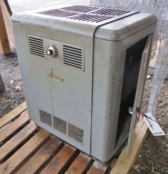 Ashley wood stove, has cast iron doors and shaker grate, 34"W x 28"D x