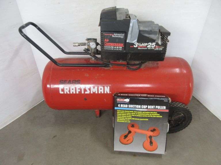 Craftsman 125 PSI air compressor, 3.5 HP, top is duct taped, as is