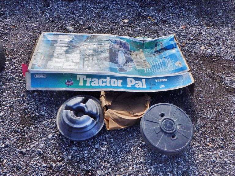 Lawn tractor tool rack, NIB; (2) Lawn mower wheel weights, used