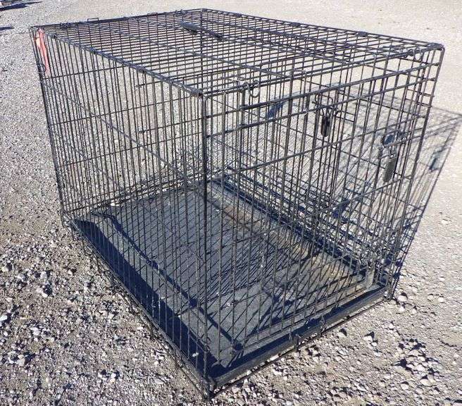 Large metal dog crate with divider, 24" x 36" x 27", good Albrecht Auction Service