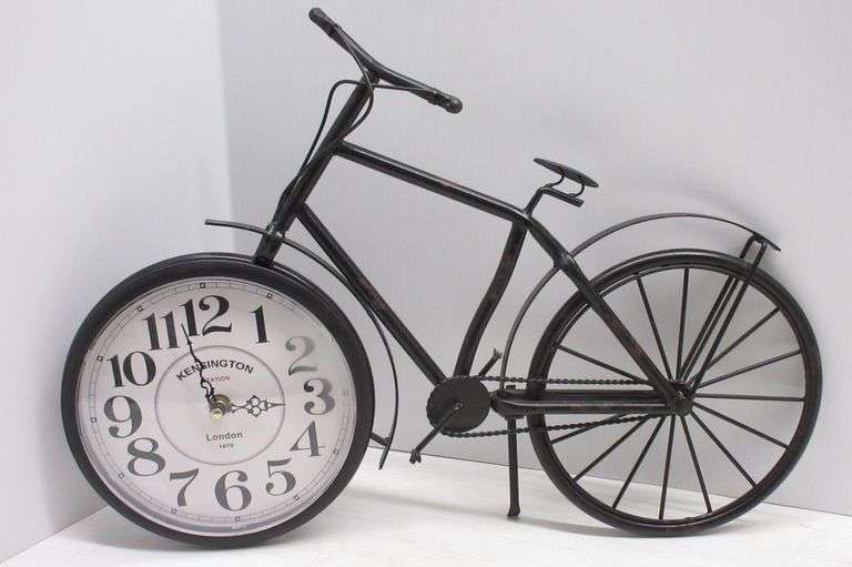 Metal bicycle clock, Kensington Station London, 19"W x 13 1/2"H, works