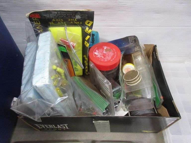 Rubbermaid cooler full of assorted fishing tackle, bait, lures, rubber