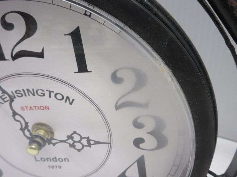 Metal bicycle clock, Kensington Station London, 19"W x 13 1/2"H, works