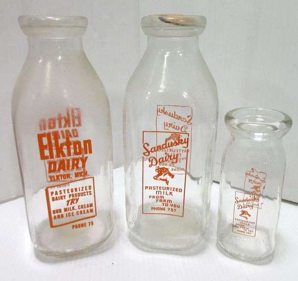 Sandusky dairy bottles, includes Quart with lid and pint; Elkton dairy