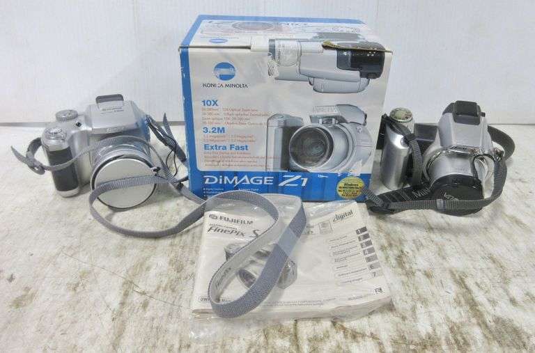 (3) Older digital cameras, includes 2 Minolta Dimage Z1, one has