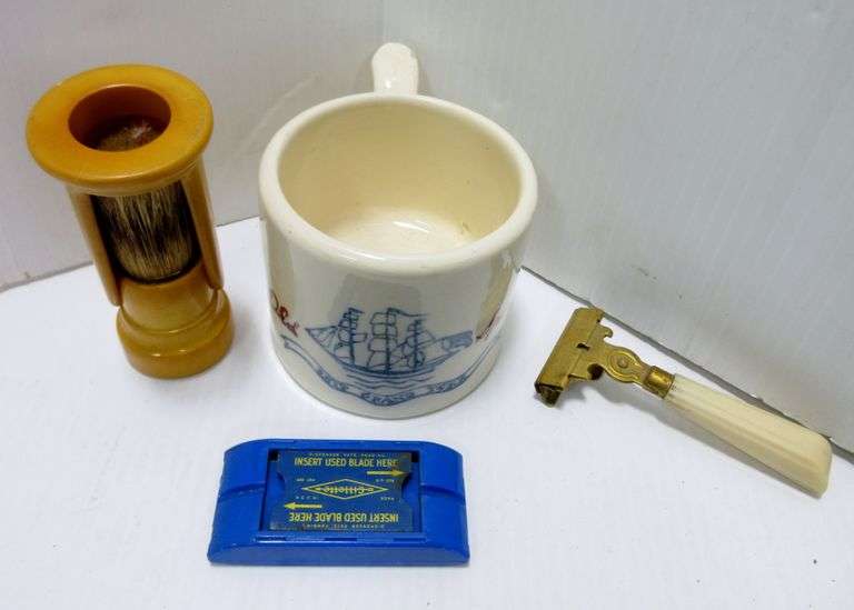 Older Old Spice shaving cup; Shaving brush with stand; Older Schick razor, gold tone with