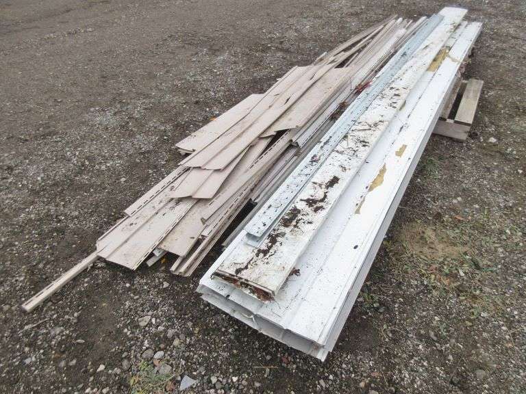 Siding trim and soffit, various sizes, from Menards, color sand, mostly
