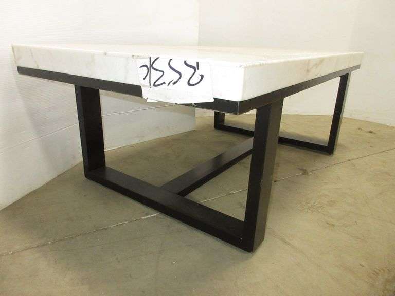 Solid marble coffee table, 48"W x 26"D x 17 1/2"H, has scratches