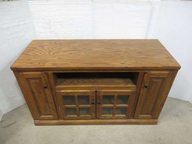 Heavy TV stand on wheels, 55"W x 22"D x 32"H, has a scratch on top