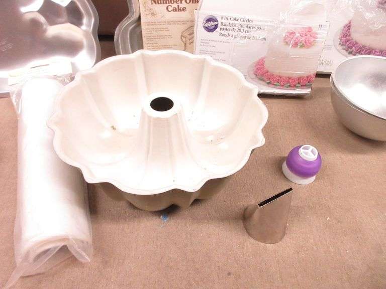 Wilton cake decorating supplies, includes Spring form pans, cupcake