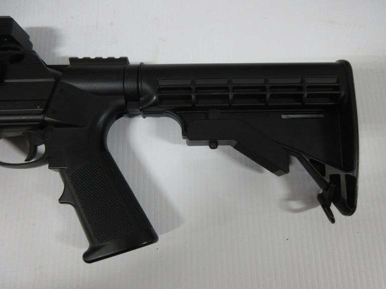 (2) Airsoft guns, include Spring powered shotgun with red dot sight