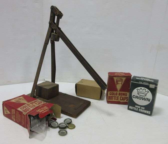 Antique bottle cap installer and hundreds of caps, made by Art Brass