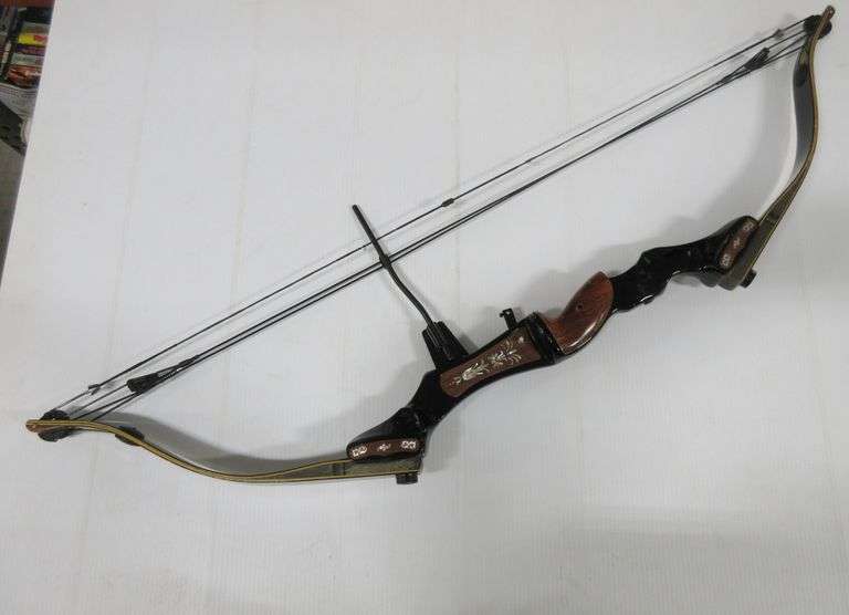 Firecat Pro XR series right handed compound bow by Martin, mother of pearl inlay, some scratches
