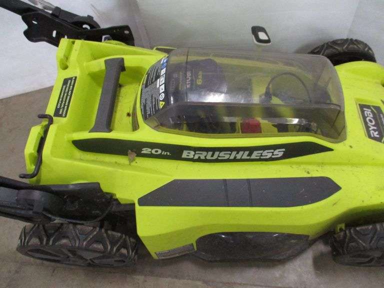 Ryobi 40V lawn mower with 6 AMP battery, charger, bag, and mulch shoot