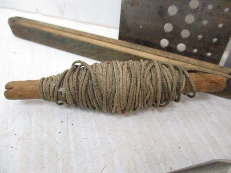 Plumb bob, (2) drill bit sizers, and an antique ruler Albrecht