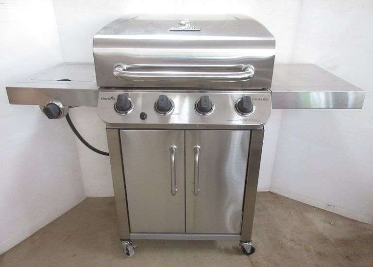 CharBroil grill with fourburners and one side burner, comes with 20