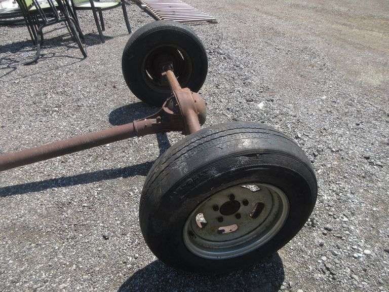 Small truck axle with tongue, hitch, 54"W x 92"L, used, as is