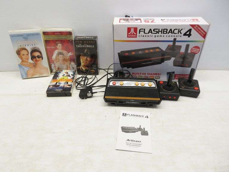Atari game console flashback 4 and four VHS tapes Albrecht Auction