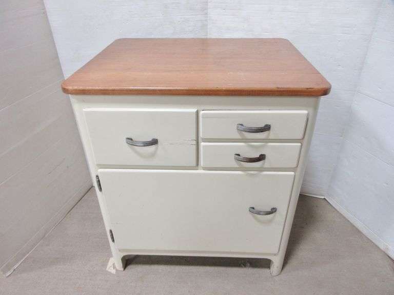 Old wood kitchen with Hoosier bread drawer with tin bread
