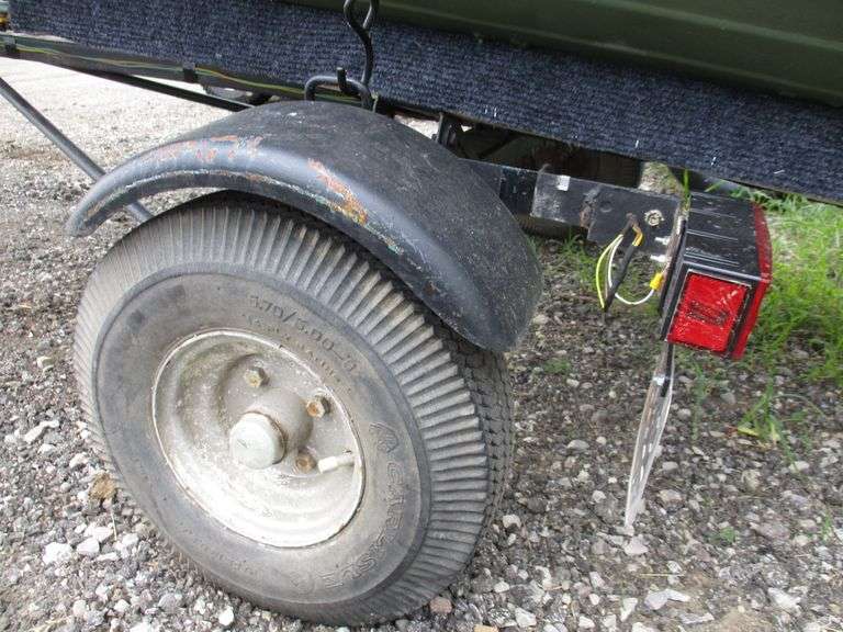 1982 Starcraft 14' aluminum Vhull boat with a 9.9 HP Mercury twostroke motor, 14' trailer with