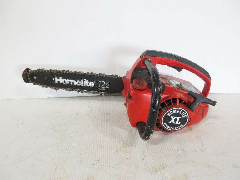 Homelite chainsaw 12" bar, has automatic oiling, last used two years