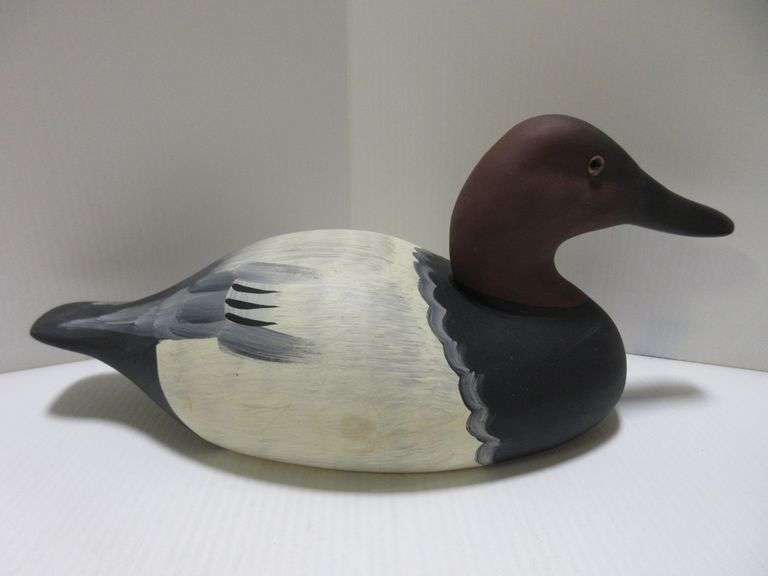 Hand carved and painted canvasback drake decoy by Raymond Hornick in