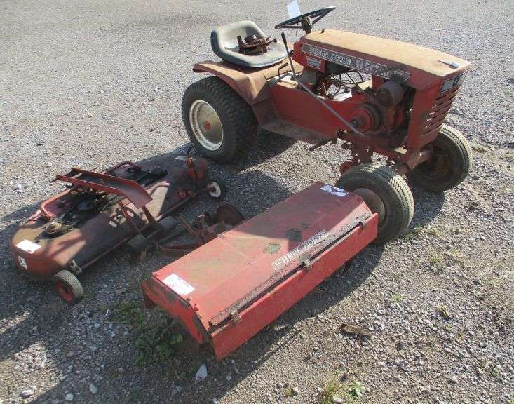Wheel horse elctro 12 tractor with 42" deck and 36" rototiller
