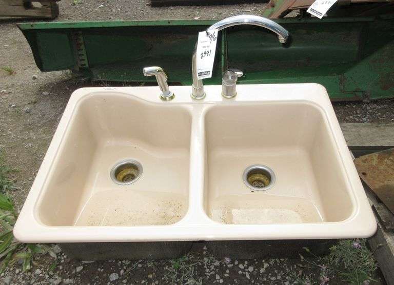 Beige twosink top mount ceramic sink, 33" x 22" x 10", good, used