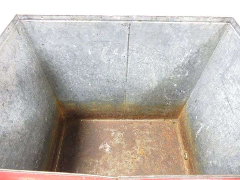 Older Coca Cola cooler, has a bottle opener on the side and a drain