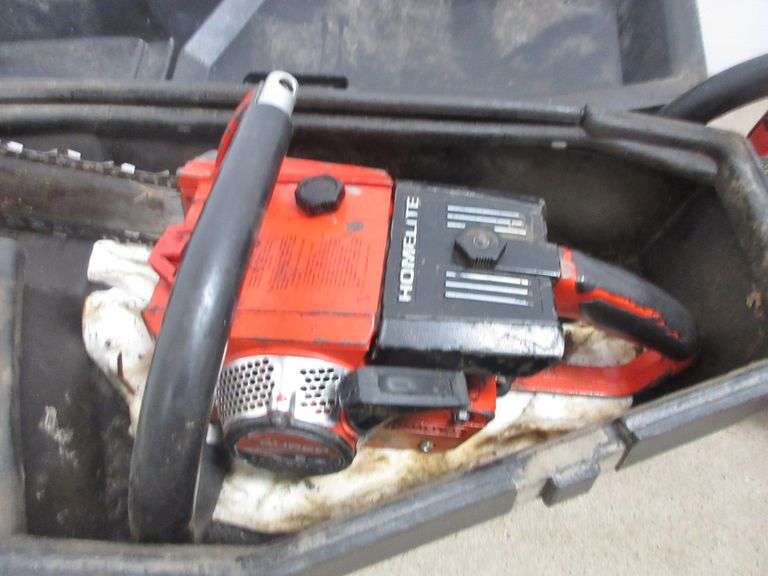 Homelite Super EZ automatic chainsaw with case, comes with extra saw