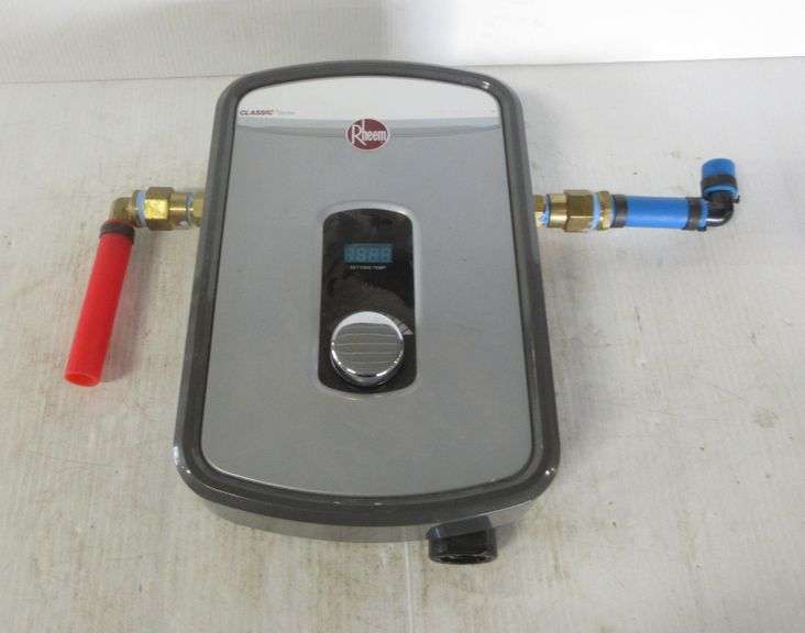 Rheem on demand water heater, used one year, in working condition