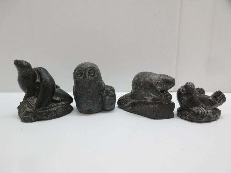 (4) "The Wolf Sculptures" a wolf originals collection Indigenous soapstone, Canada; Owl pair