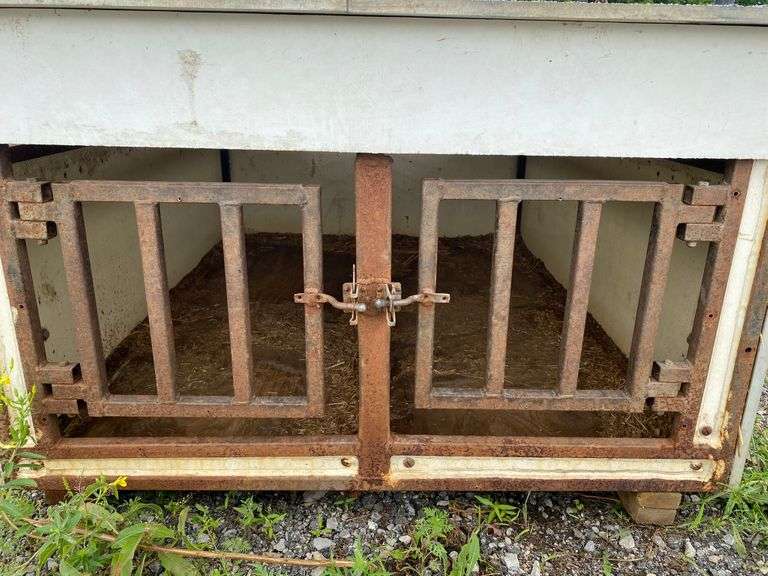 Dog box, has rig rack on top, rig holes on sides for dogs head to stick out, doors on sides that