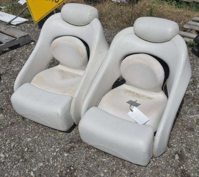 (2) Boat Captains Chairs, no rips or tears, both with foldup bolsters