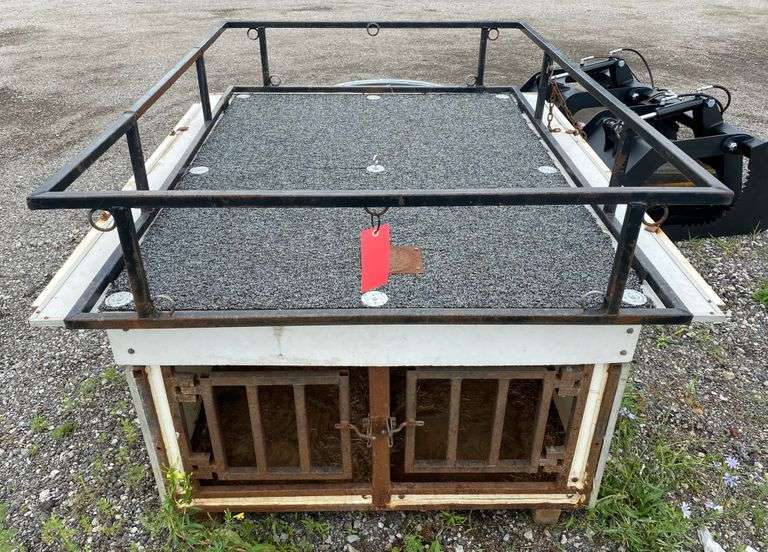 Dog box, has rig rack on top, rig holes on sides for dogs head to stick out, doors on sides that