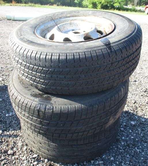 Donut rim with four-lug tire, (2) 16