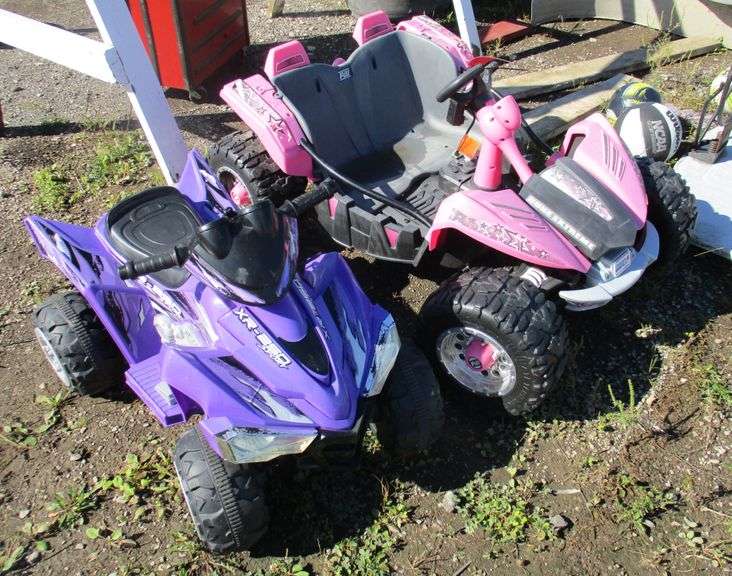 (2) 12V battery powered ride ons with batteries and chargers 1 Is a