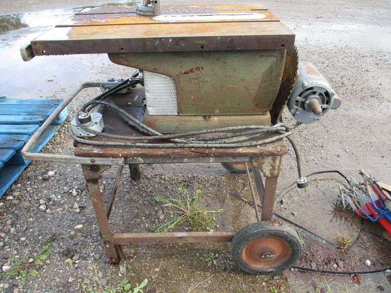 Craftsman table saw on wheels, 2'W x 3'D x 3'H, works well, used