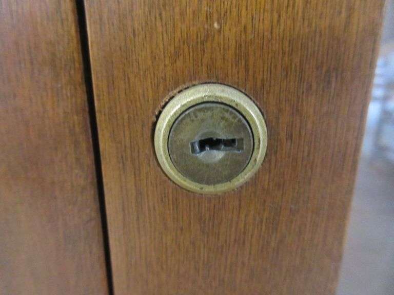 Gun keys in drawer, door is plexiglass, 33"W x 13"D x 66"H