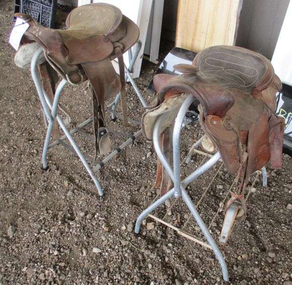 (2) Saddle racks, good; (2) Old saddles - Albrecht Auction Service